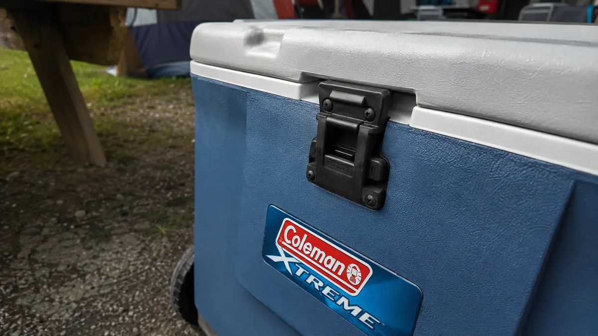Close-up of the Coleman Xtreme rolling cooler's latch and lid seam